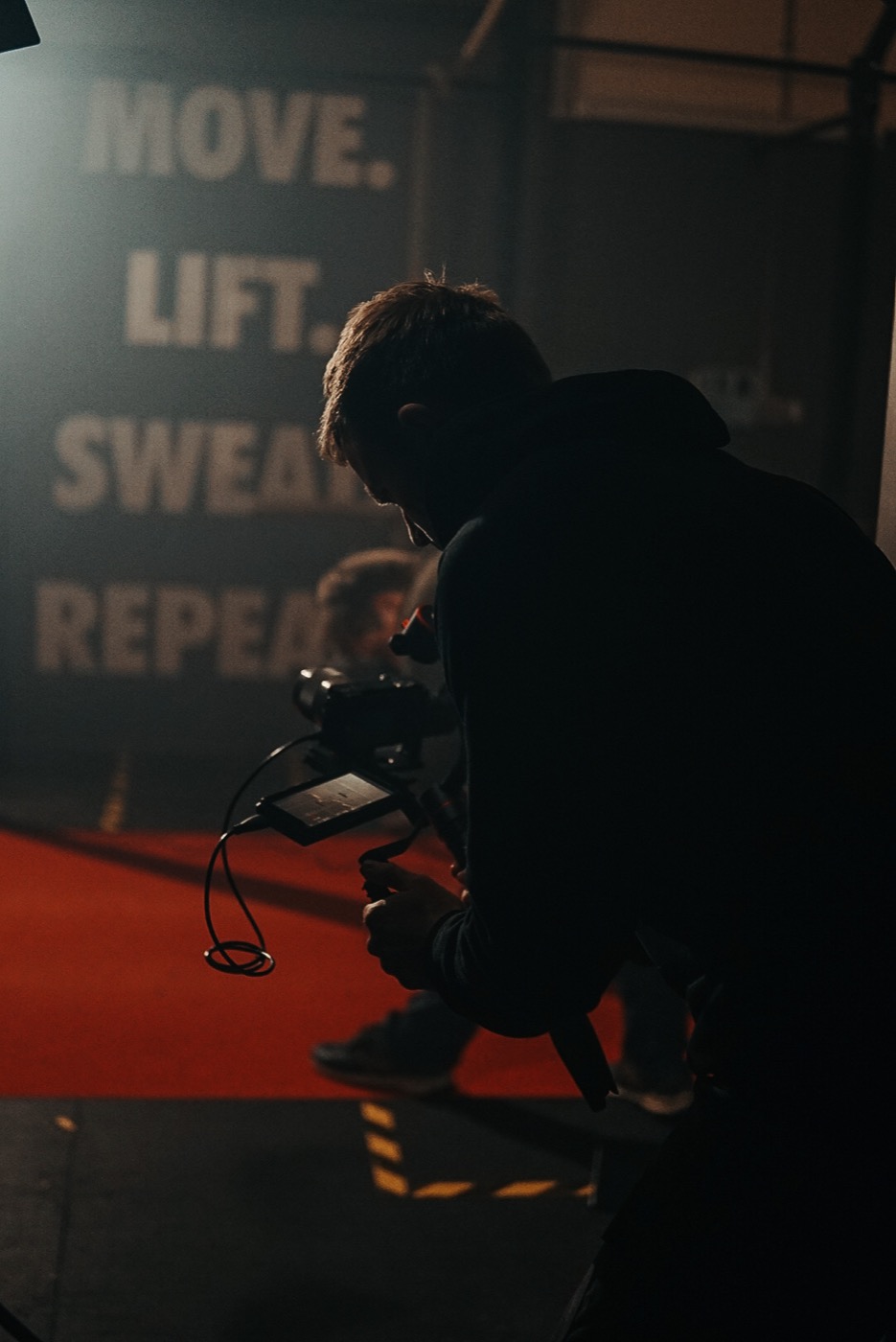 Behind the scenes filming gym video content